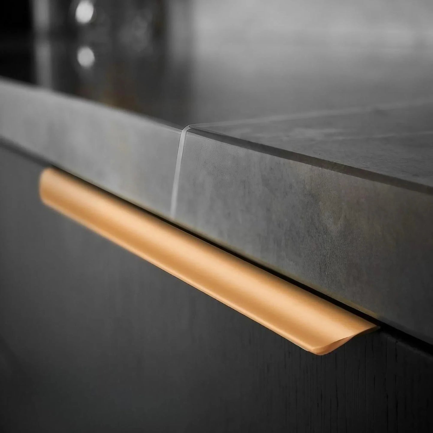 gold cabinet edge handle on kitchen drawer
