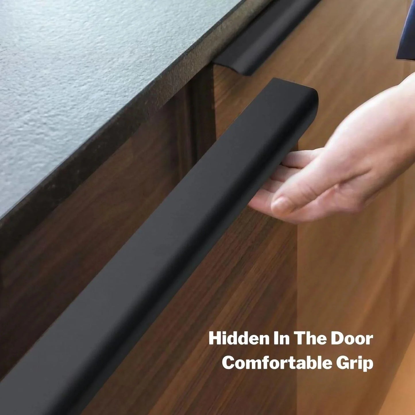 Matte black cabinet edge pull on kitchen cabinet