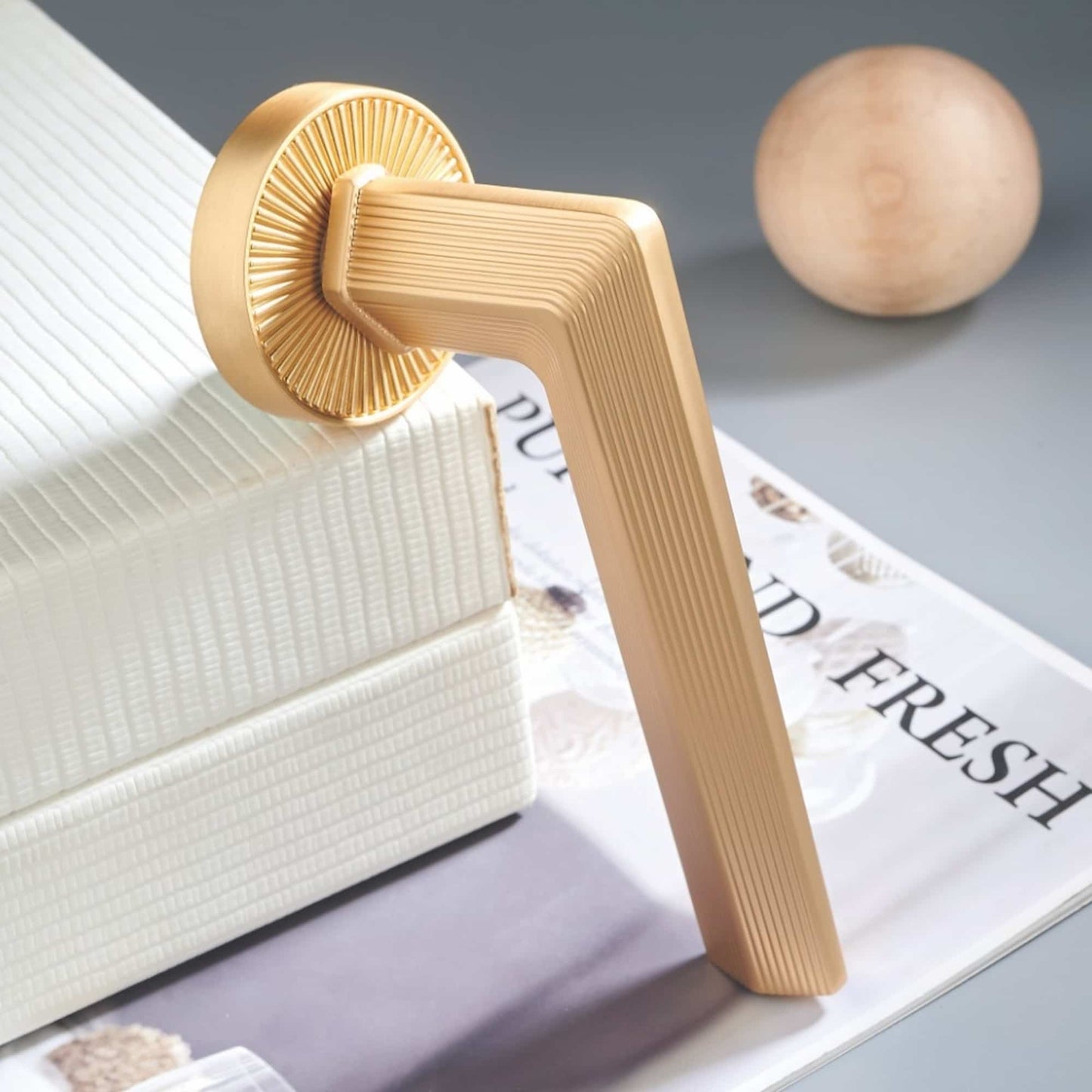 Side profile view of luxury ribbed interior lever door handle showing ergonomic lever design