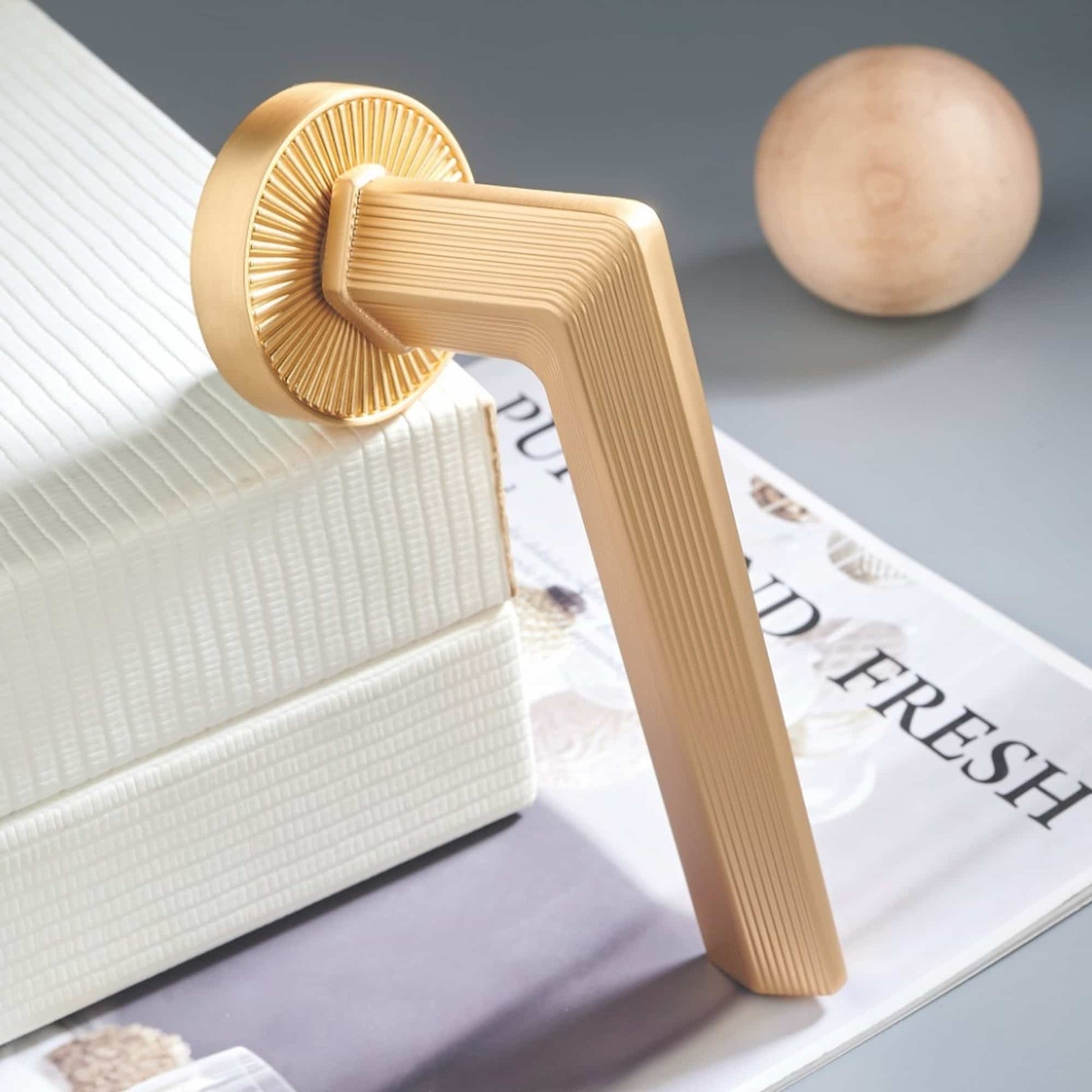 Side profile view of luxury ribbed interior lever door handle showing ergonomic lever design