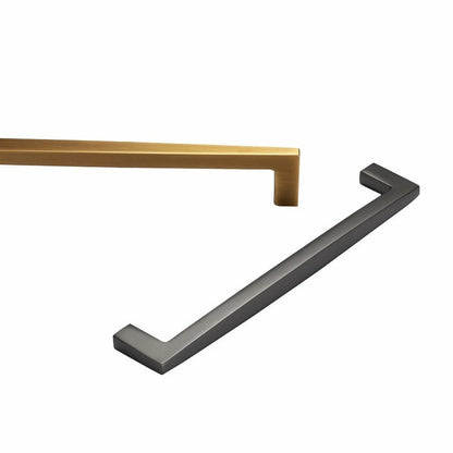 Close-up detail of minimalist kitchen cabinet handles showing premium zinc alloy craftsmanship and smooth finish