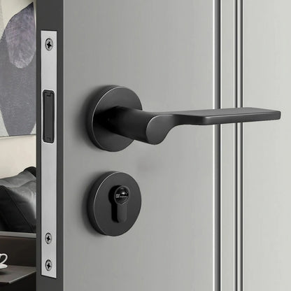 Modern keyed interior door handle installed on a contemporary door