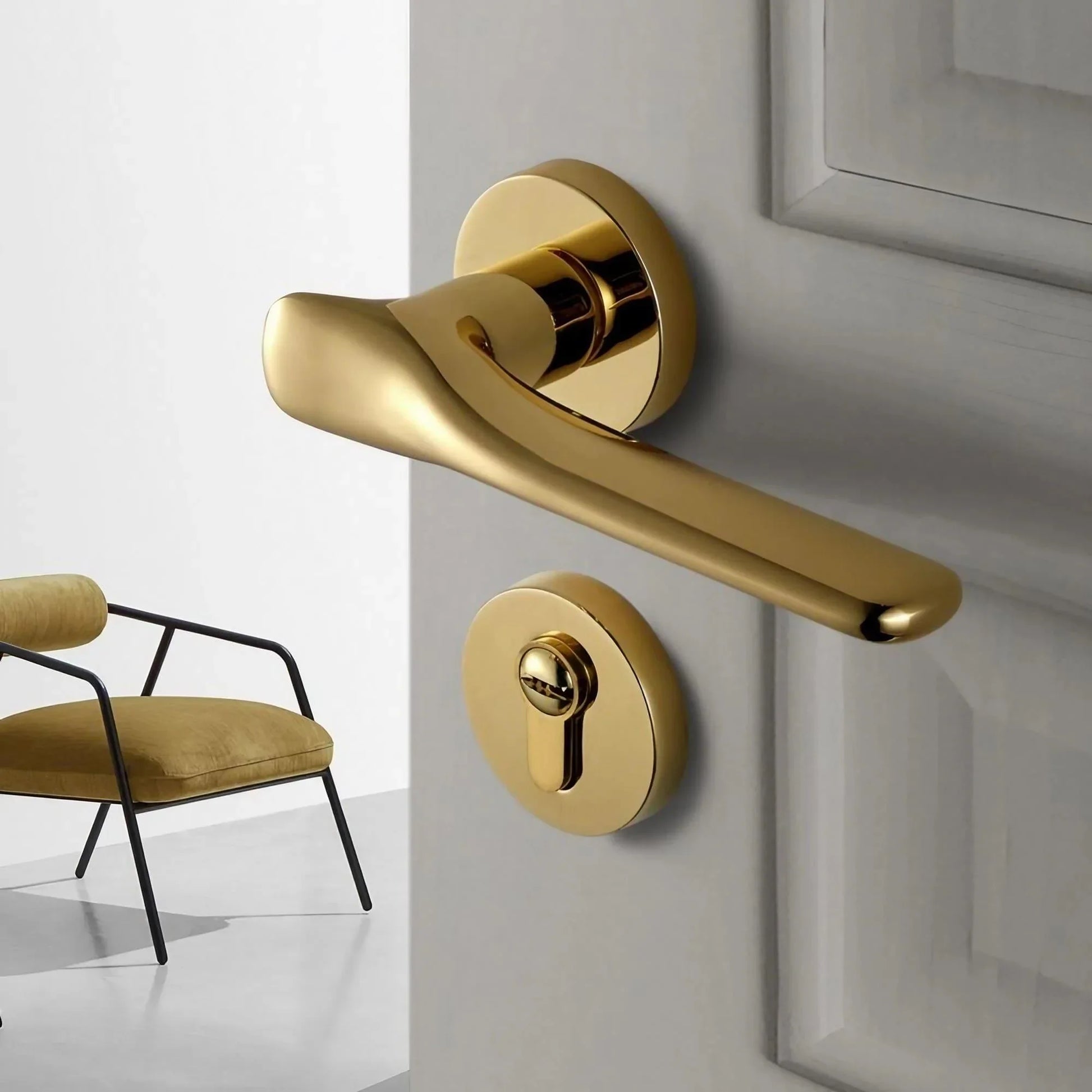 Modern silent bedroom door handle with privacy lock in PVD gold finish